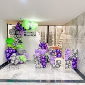 แบคดรอปลูกโป่ง ฉากลูกโป่ง Corporate Events Balloon Backdrop - DCH Welcome - Green & Purple Mosaic Balloons